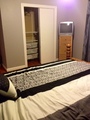 Guest bedroom with dble bed cont store closet view
