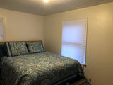 Master bedroom with queen