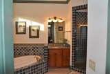 Master bath with one sink and shower
