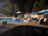 Night pool from hot tub