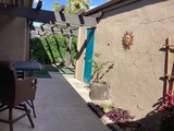 Courtyard pergola   door to garage